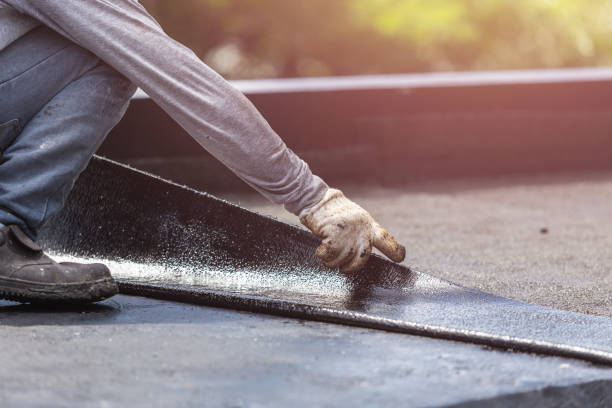 Professional Basement Waterproofing technician working in Ashippun, WI